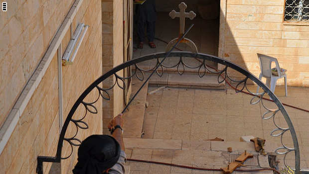 ISIS removes crosses and manifestations of polytheism
